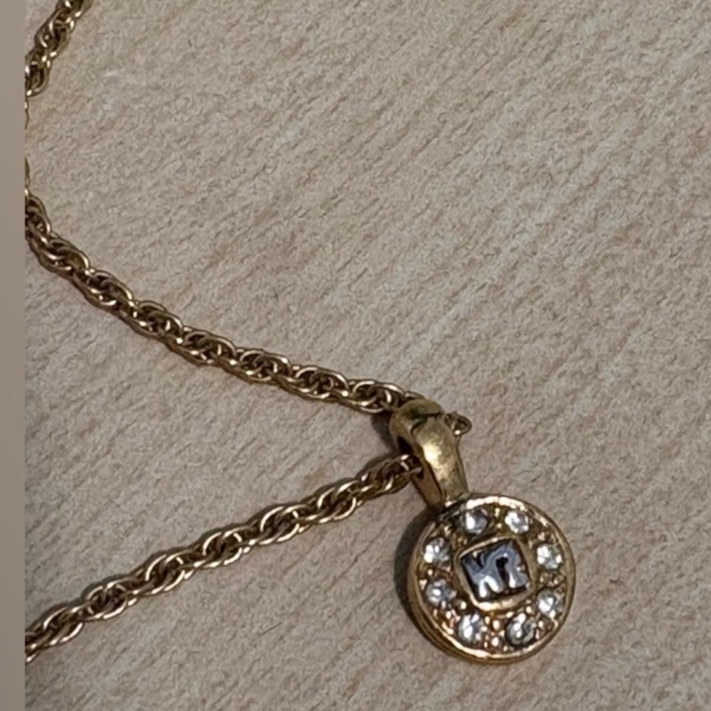Authentic Nina Ricci Gold Pendant Necklace